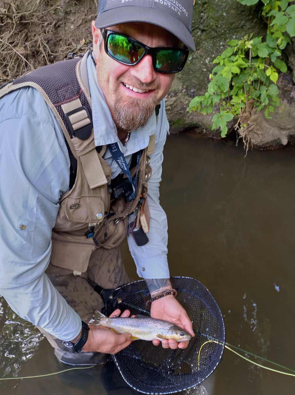 Photo of Gordon with a trout